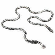 A heavy 5mm sterling silver Byzantine necklace with ornate end caps and a lobster clasp.