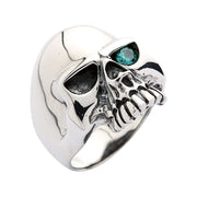 925 sterling silver skull ring with blue topaz gemstone eye side angle view