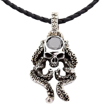 Front view of the black onyx octopus skull pendant in .925 sterling silver, shown on a cord for display