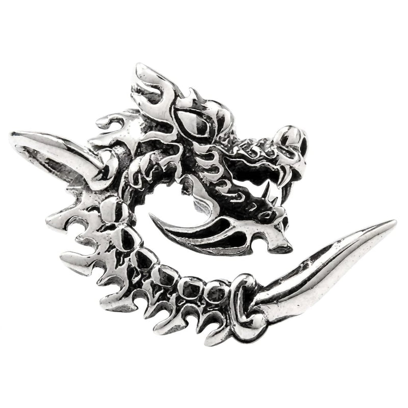 Coiled sterling silver dragon pendant shown head-on, long tapered claw sweeping out to the lower right.