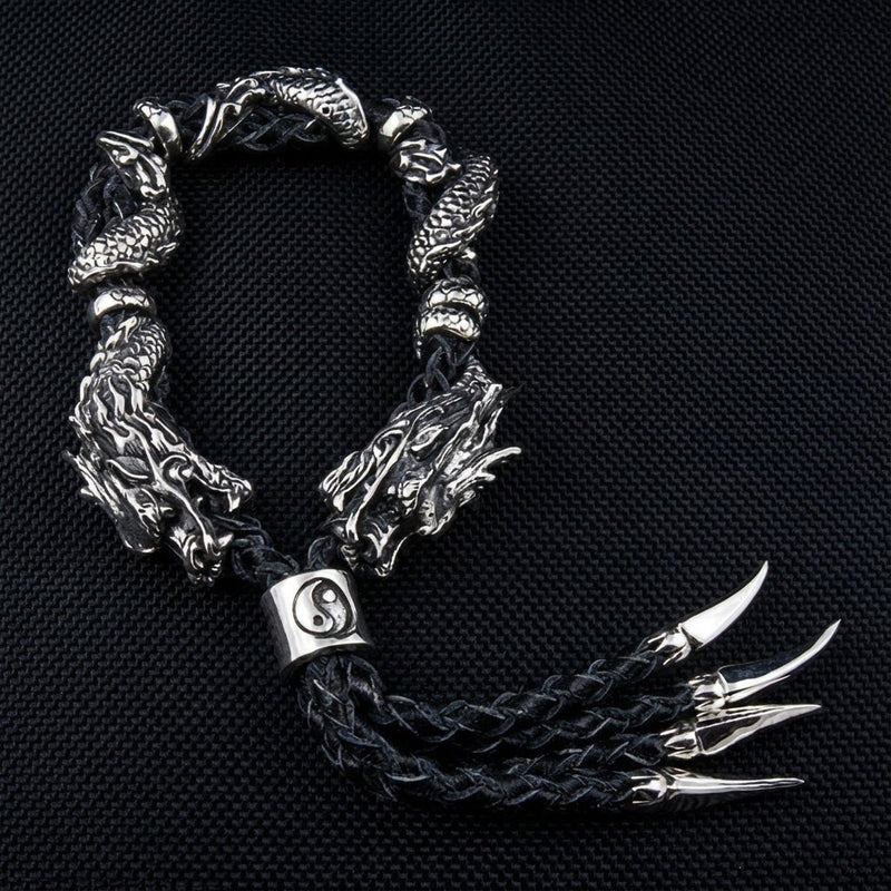 Geflochtenes schwarzes Lederarmband mit zwei Drachenköpfen aus 925 Sterling Silber, Yin-Yang-Perle und scharfen Klauen-Anhängern