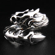 A solid sterling silver dragon armor ring featuring a detailed dragon head.