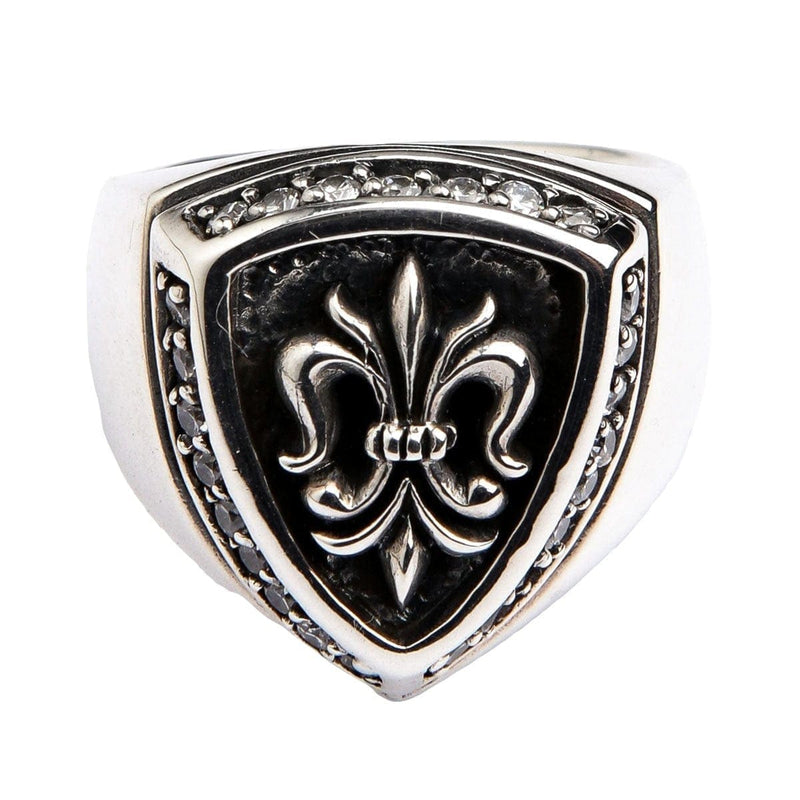 Front view of the fleur de lis silver ring featuring diamond-clear CZ stones on a shield design.