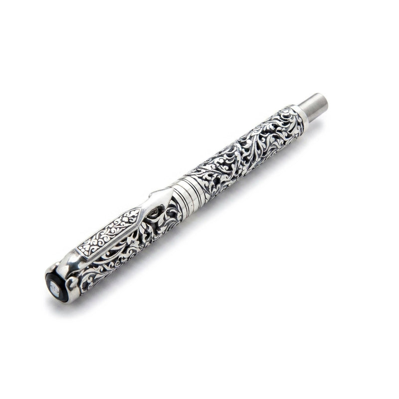 Full length view of the .925 sterling silver pen with continuous hand-carved Celtic floral pattern across the barrel and cap