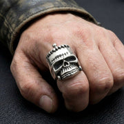 Frankenstein skull sterling silver ring worn on hand with leather jacket showing detailed stitches and bolts