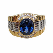 A front view of the men's sapphire Rolex-inspired ring in 14K gold plating.