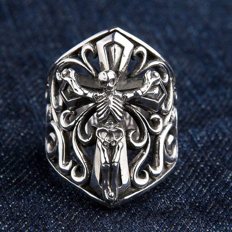 Top view of the heavy gothic crucifix skull sterling silver ring featuring a skeleton figure on an ornate cross backdrop.