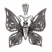 Front view of the gothic skull butterfly moth pendant in sterling silver, showing the intricate filigree wings.