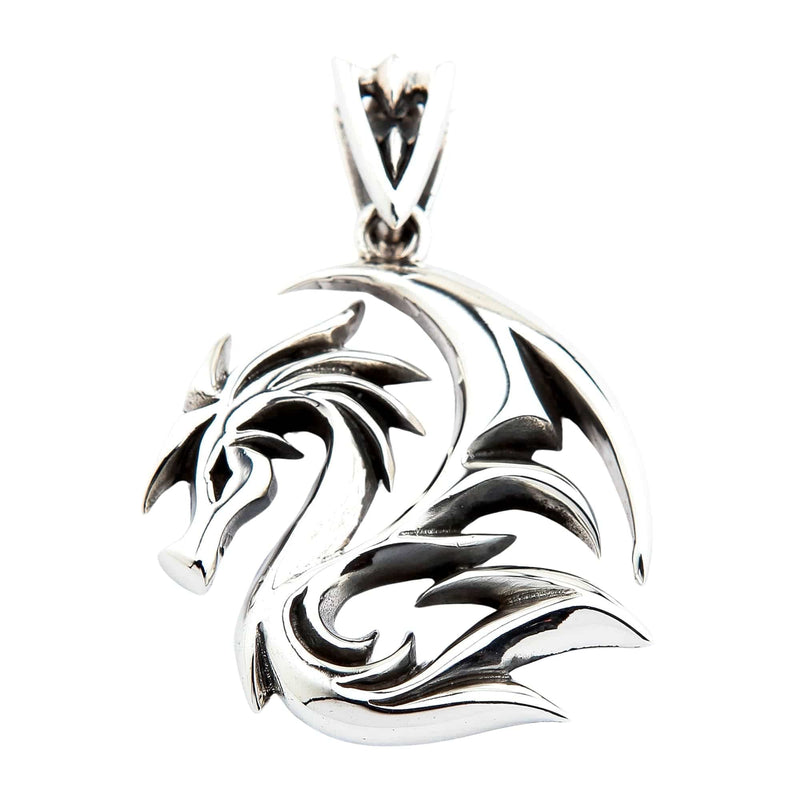 An angled view of the gothic tribal dragon pendant, highlighting its high-polish finish.