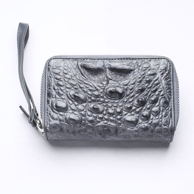 Gray genuine crocodile leather wallet front view showing hornback scale texture