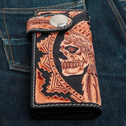 A hand-carved genuine leather American Indian biker wallet featuring a detailed tribal skull with a headdress.