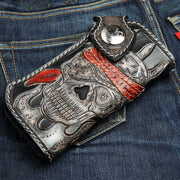 A premium, hand-carved pirate skull leather wallet with a detailed red bandana, flames, and a silver concho.
