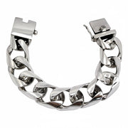 A heavy silver curb bracelet, 190g, in a curved view showing the thick 1-inch polished links.