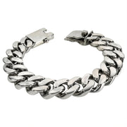 A heavy 18mm Cuban link bracelet in solid sterling silver with a brilliant high-polish finish.