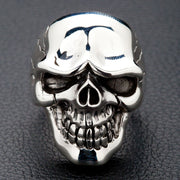 A front view of the heavy sterling silver handsome skull ring, showing its polished finish and stylized design.