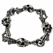 Top down view of heavy silver skull bracelet linked by detailed bones