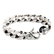 Full view of heavy sterling silver curb bracelet with open trigger clasp