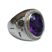 Huge 21-carat natural amethyst bishop ring in sterling silver with a diamond halo setting.
