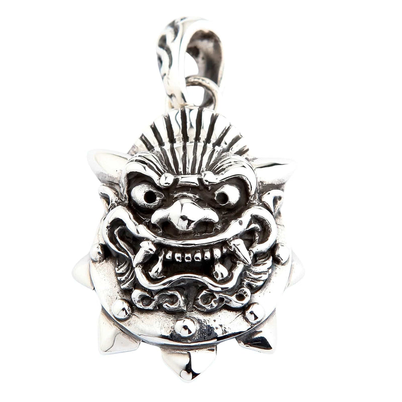 Front view of solid .925 sterling silver Japanese Oni mask pendant featuring furrowed brow, bared fangs, and oxidized details