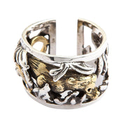 Front view of the Japanese gold tiger ring showing the gold-plated tiger and silver bamboo design.