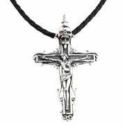 Front view of the Jesus Skull Cross Pendant in sterling silver, featuring a crucifix with a skull and red garnet eyes.