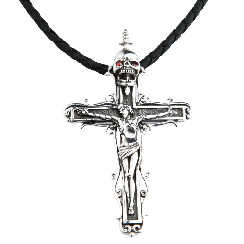 Front view of the Jesus Skull Cross Pendant in sterling silver, featuring a crucifix with a skull and red garnet eyes.