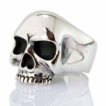Front view of the Keith Richards skull ring in polished .925 sterling silver showing carved teeth and deep eye sockets