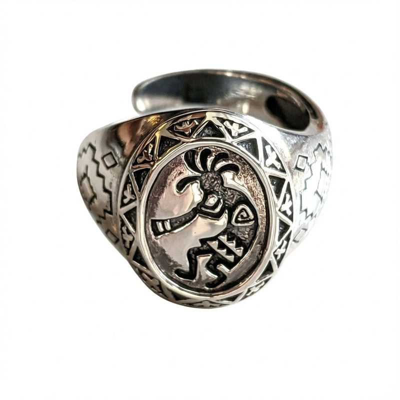 Front view of Kokopelli sterling silver ring featuring flute player icon