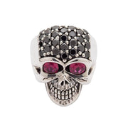 A sterling silver lady skull ring with a cranium completely paved in black crystals and two large, deep red stone eyes.