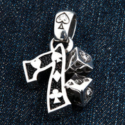 A solid sterling silver lucky number 7 dice pendant with intricate card suit details and sparkling CZ stones.