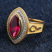 Marquise cut ruby bishop ring with gold band and diamond halo side angle view
