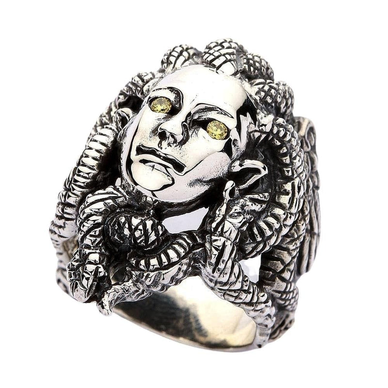 Front view of the sterling silver Medusa ring with yellow CZ eyes and coiled snake hair detail