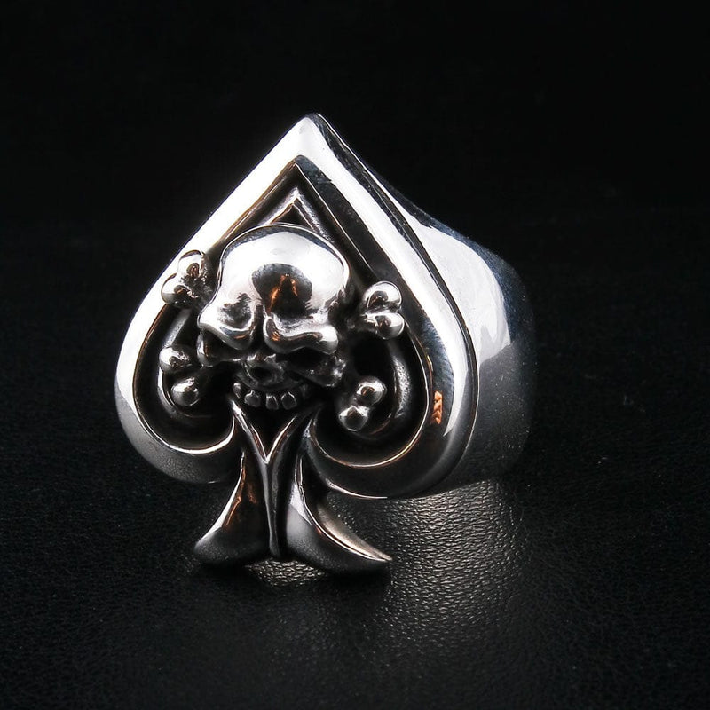 A men's solid sterling silver ring in the shape of the Ace of Spades with a skull and crossbones emblem.