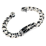 A men's solid sterling silver ID bracelet featuring a black Union Jack design on the plate.