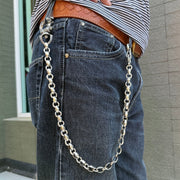 A man wearing the 23-inch solid silver biker wallet chain, showing how it hangs from a belt loop.