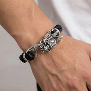 Sterling Silver Dragon Leather Bracelet worn on a male wrist