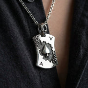 Close up lifestyle shot of the Ace of Spades pendant as a stylish mens necklace