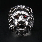 Front view of the men's lion head ring featuring fierce red garnet CZ eyes.