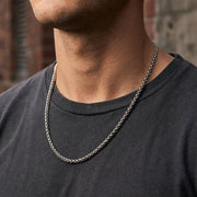Close-up of man wearing 22-inch length 3.5mm thick necklace chain in urban style