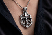 Man wearing Sterling Silver Gothic Crucifix Shield Pendant on a chain