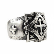 A men's sterling silver Celtic cross ring with a shield design and oxidized details, shown from the side