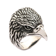 Men's sterling silver eagle head ring showing detailed side profile with hand-carved feathers and sharp beak