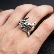 Male model wearing a detailed 925 sterling silver shark ring on finger, bold biker style jewelry for men