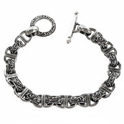 The full 925 sterling silver ornate toggle bracelet, showing the tribal scrollwork links and decorative T-bar clasp.