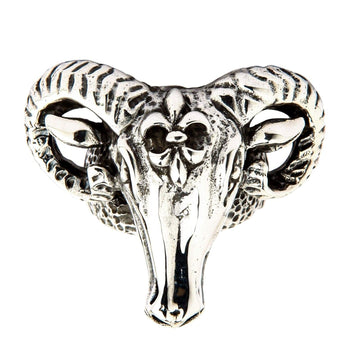 Front view of the sterling silver Ram Head Ring showcasing curled ridged horns and a prominent forehead emblem.