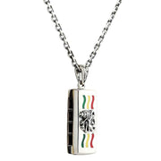 Rasta lion harmonica pendant front view showing Lion of Judah and colorful enamel stripes on sterling silver
