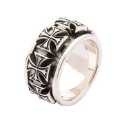 The 14mm wide silver iron cross ring, highlighting its substantial thickness.