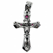Front view of the sterling silver skeleton crucifix pendant with a red ruby CZ stone and intricate skull details.