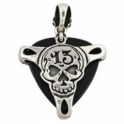A sterling silver guitar pick holder pendant featuring a number 13 skull design, shown holding a black pick.