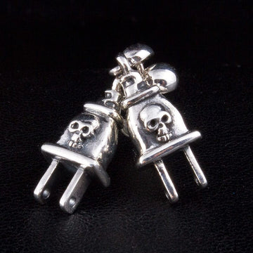 Pair of skull power plug sterling silver drop earrings showing detailed skull design on polished silver